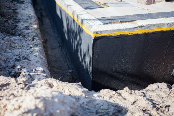 Professional Waterproofing technician working in Vaughnsville, OH